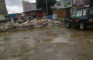 A pile of garbage on one of Lusaka's flooded streets today January 19, 2017