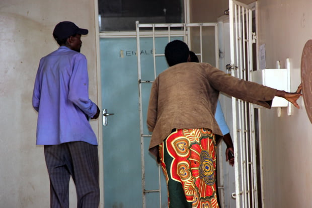 Patients turned away by security guards after the closure of Lusaka's Chainama clinic-picture by Tenson Mkhala