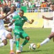 Zambia Chipolopolo skipper Rainford Kalaba tries to beat his opponent