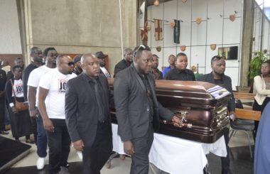 Joe Chibangu's casket being carried by different Zambian artist yesterday-Picture by Tenson Mkhala