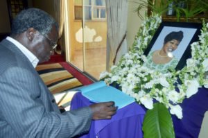 People's Party leader Mike Mulongoti signs a book of condolences for the late Regina Chiluba in Lusaka-Picture by Tenson Mkhala