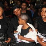 Late Joe Chibangu's wife Jubilee and daughter ( c) at Cathedral of the Holy Cross in Lusaka