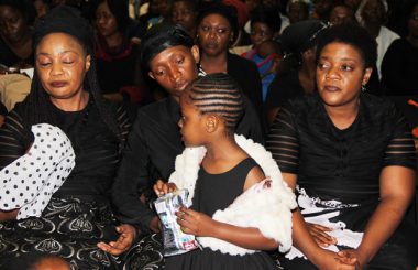 Late Joe Chibangu's wife Jubilee and daughter ( c) at Cathedral of the Holy Cross in Lusaka