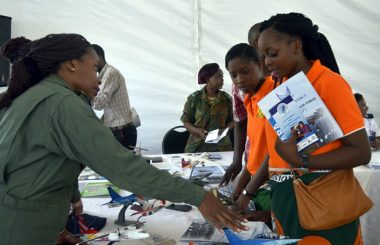 ZAF officer explains how an areoplane works to members of the public at East Park Mall during a wwomen's exhibition-picture by Tenson Mkhala