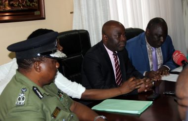 Defense minister Davis Chama with Home Affairs counterpart Stephen Kampyongo and deputy Inspector General of Police Malcome Mulenga (l) during a joint press briefing in Lusaka -picture by Tenson
