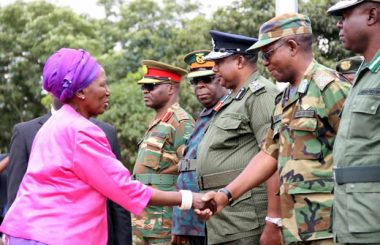 Vice president Inonge Wina greets deputy defense and security chiefs during Youth Day celebrations in Lusaka-picture by Tenson Mkhala