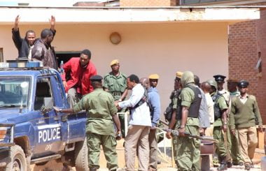 UPND leader Hakainde Hichilema with his co accused being taken back into detention-picture by Tenson Mkhala