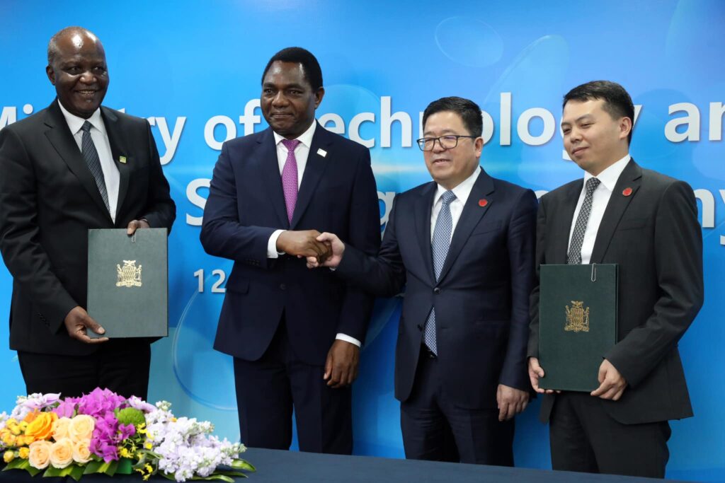 President Hakainde Hichilema, Minister of Science and Technology Felix Mutati and ZTE officials during the signing of an MOU for the setting up of a smartphone assembly plant in Zambia – Picture credit HH presidential Facebook page