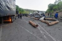 A truck allegedly carrying Mukula logs overturns at Kapilingozi Hills on its way to Chirundu border