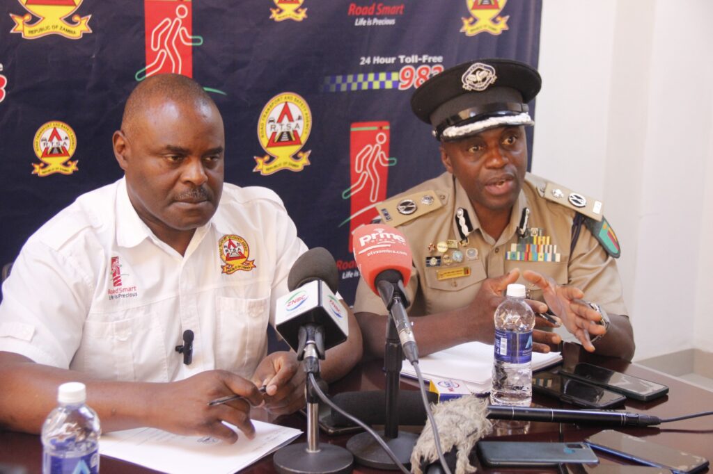 Zambia Police Spokesperson Rea Hamoonga (r) and Road Transport Safety agency Director Amon Mweemba (l) speaking to the media during the launch of the speed camera enforcement press briefing at RTSA headquarters in Lusaka on Friday-Picture by Chongo Sampa