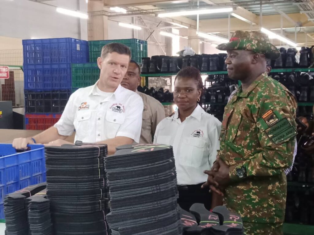 Zambia Army Commander Sitali Alibuzwi with Zamleather General Manager Richard Franklin and Zambeef CEO Faith Mukutu during the Army’s tour of the Zamleather factory – picture by Philip Chisalu