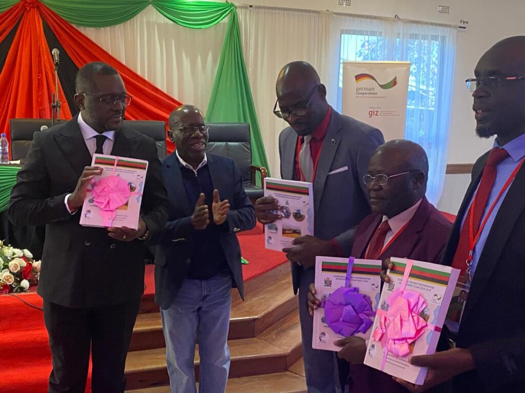 Minister of Local Government and Rural Development Gary Nkombo launching the Integrated Development Plans (IDPs) for eight districts in Luapula Province- Picture credit MLG