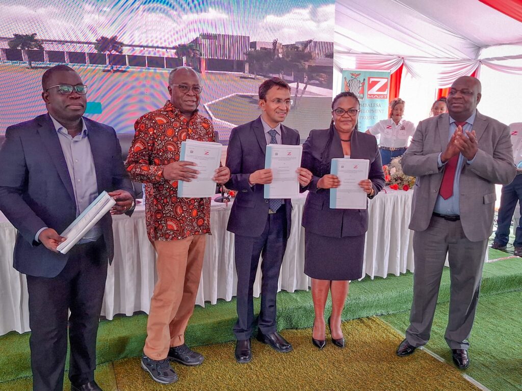 Commerce Minister Chipoka Mulenga, Finance Minister Situmbeko Musokotwane, Z-MART CEO Soni, Copperbelt Minister Elisha Matambo during the signing ceremony of the cconcession agreement for the upgrade of Kasumbalesa border post, Auxilary infrastructure- Picture credit Matambo official Facebook page