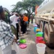 Kitwe residents draw water from a bowser