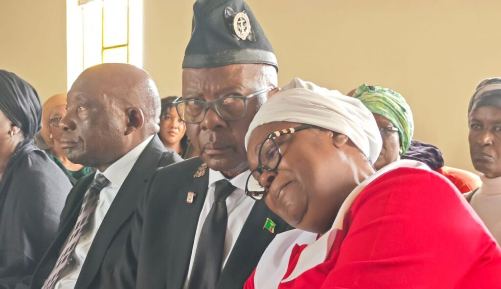 Former Energy Minister Mathews Nkhuwa with his wife during the church service for their son in Chingola.